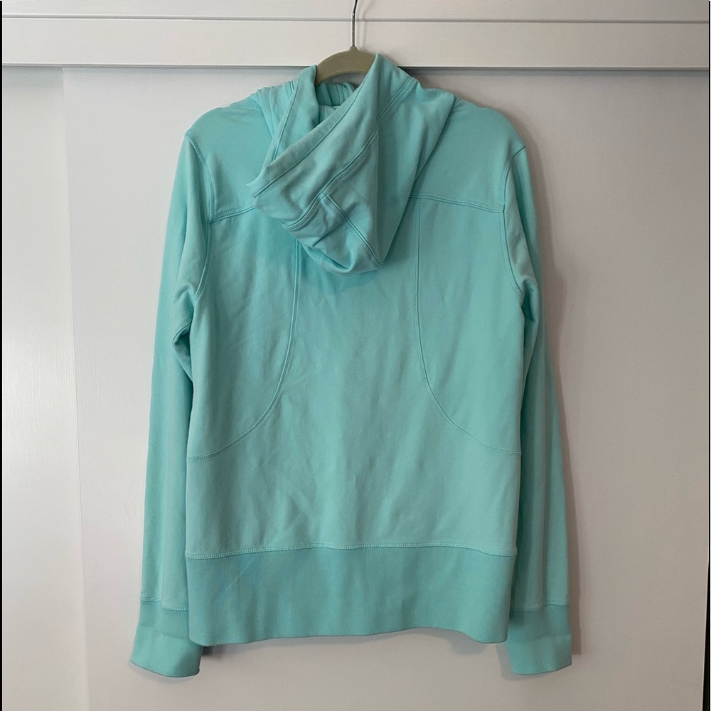 Turquoise athletic jacket. - Picture 2 of 2